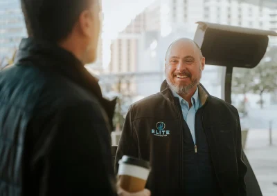 Scott Martin, Business Dev at ELITE, shares a laugh with an industry partner